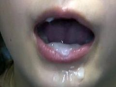 Cock loving Japanese chick gives a blowjob to at least four guys at the same time. She also gets her mouth filled with cum.