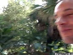 Exotic curly sexy beauty with natural boobs and great seductive skills in slutty outfit teases handsome punk and reveals her delicious ass to him in backyard action filmed in close up
