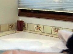 Pretty amateur brunette babe Billy rubs her natural boobs in the bathroom