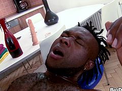 Paul can't believe his eyes what a gorgeous body this black hunk has. He takes great pleasure in massaging his firm sexy muscles and when the black adonis turns on his back and shows him his dick Paul can't hold himself no more. He grabs his black balls with greed and swallows that cock with lust.