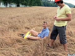 A twink is walking down the street when he sees a path. He walks down the path and sees another twink in the middle of the field jacking of. He offers to sucks his cock. They have gay sex and cum all over each other.
