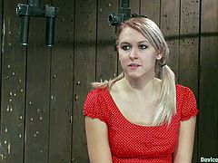 Pigtailed blonde Katie Summers is having fun with some dude in a basement. She lets him put her into irons and then loves the way he plays with her juicy cunt.