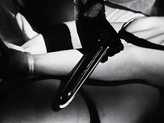This black and white video featuring Mistress Morgana includes domination, torture and a black glove that can cause havoc in a girl's pussy.