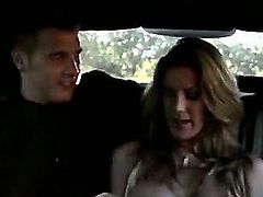 Chris Johnson and Kayla Paige sit on the back seat of the luxurious car. Pretty soon she will show her magnificent boobies and he is going to try out her lovely cunt.