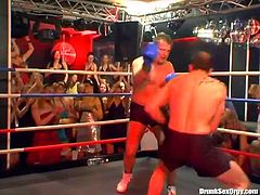 Horny bitches go madly exciting watching brutal dudes fighting on a ring. So when the fight ends they all join these men on a stage going kinky and wild.