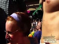 Topless chicks dancing at big outdoor party