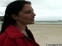 This brunette is all natural. Kinky nympho likes wandering along the beach. Horn-mad slut smiles when spoiled dude offers her to pose on cam. Bitchie slim nympho jams her tits, turns and shows pale ass proudly right outdoors.