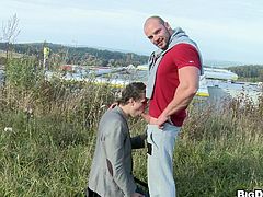 Tomm is a big guy and Christian finds out how big his dick is! He gives him a hot head between those big trucks and then they go in an open field to have more fun. This time is Christian's turn to get sucked so the hunk Tomm goes down on his knees and delights himself with that sweet cock.