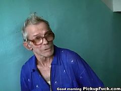 Slutty brunette cutie kneels down in front of two horny dudes to oral fuck their strain dicks simultaneously n the porch while being catched by grey-haired grandpa in sultry threesome sex video by WTF Pass.