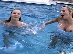 Hot bodied lesbians are swimming naked in the swimming pool. These two hotties know how to make each other happy. They pet each other's bodies with a great desire.