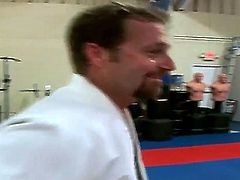 Pretty hot and sexy blonde lady Sarah Jackson doing some exercises at karate training and her naughty master gets hot and starts to fuck her.