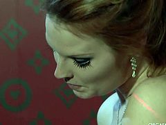 Two sextractive lesbians in peppering lingerie and stockings play with different sex toys to pet their aroused pussies including vibrator and dildo.