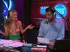 Topless blonde girl does radio interview