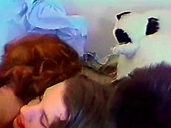 Two naughty sluts are playing in the bedroom and have a lot of fun. The more experienced redhead gives her girl a few mean pussy licks and then decides to spice things up. Relax and enjoy this classic porn and the hot bodies of these two whores!