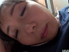 Bosomy Japanese student lies on her back with legs spread aside getting her hairy pussy fingered hard before she starts tickling it with vibrator in pov sex video by Jav HD.