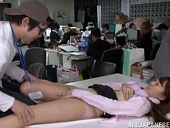 Lovely Japanese office chick lifts her skirt up and gets her pussy fingered. Then she sucks a cock and gets fucked on a table.
