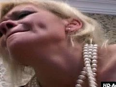 This young couple turns to mature blonde for some sexual instruction. She's a hands-on, mouth-on sex coach, she guides the husband's cock right up wifey's ass. She gets her jollies too, dipping his cock into her own pussy.
