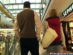 She is random chick that guy picked up in a mall. They offered her some cash for blowjob. So she pleases their dicks in public toilet in the mall.