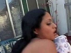 Captivating Indian girl with gorgeous body shape bends over the bench on back yard. White ass dude enters her snatch from behind banging her hard so she moans seductively.