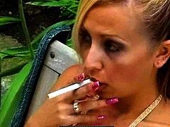 Smoking blonde shows of her cunt in public and starts masturbating like naughty