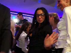 Steamy white milfs in sultry office wear dance rapaciously on the dance floor before they kneel down to give double blowjob in sizzling hot group sex video by Tainster.