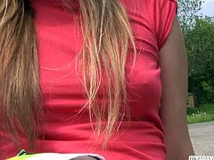 She is pretty teen gal with slim body. She is wearing mini skirt sitting on a grass next to her BF. He slips his hands under the skirt rubbing her pussy while they kiss passionately in a French way.