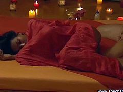 Watch a naughty brunette belle getting her hot body oiled and massaged before her pussy gets viciously fingered.