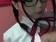 Schoolgirl Aimi with big tits