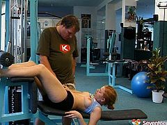 Caucasian teen chick is working out a lot in a gym. She has got personal trainer to assist her in body exercises. He seduces her for sex caresses fit body sensually. Then he eats wet tasty pussy of horny teen slut right in a gym.