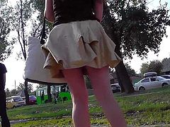 Sweet babe's sexy panties and ass are revealed in public upskirt video