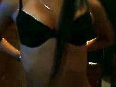 This babe has her webcam on. She's stripping off all her clothes, showing off her nice ass and tight body.