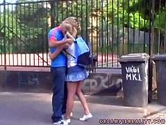 Charming blonde with funny pigtails allows her boyfriend to dig his fingers under her skirt. He finger fucks her pussy and makes her horny.