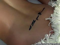See a naughty brunette temptress getting her hot body oiled and fucked hard in this sexy massage vid.