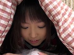 Well well, look what I have under my blanket! It's my sweet, girlish Japanese teen and she wants to have a taste of my dick. This young, innocent looking cutie plays with my hard cock and then takes it out to lick it. I think a load of jizz on her face will make her happy, should I give her some?