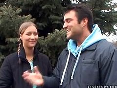 Frisky brunette amateur heads to the woods with a horny dude. She takes off her pants in front of him to pisses on the ground in perverse sex video by 21 Sextury.