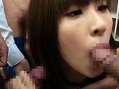Kinky jap school slut giving double blowjob in class gangbang