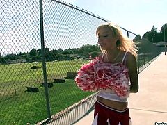 Busty cheerleader girl Morgan Layne shows off her pink snatch