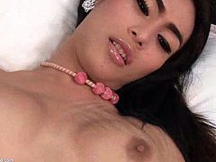 Ladyboy Gor is a gorgeous shemale. She gets a short handjob and a guy puts a butt plug in her ass hole.