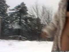 Naughty brunette hoochie pisses on the snow and exposes her shaved pussy in a public. Watch pissing shameless brunette girlfriend for free.