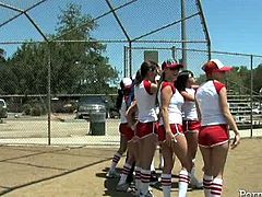 Group of salty young chics in seductive tight fitting shorts and tanks are ready to play baseball outdoor. They run around the field seducing their fans with curvy bodies and long legs.