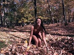 Have you ever seen a chick lay naked on a bed of crunching fallen leaves outdoors and finger her pussy away? No? Here's your chance!