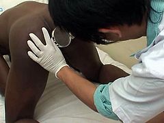 Catching that his black patient's eyes is glued to his boner, this Asian doctor pull it out and in an instant he stick it inside the gay black patient's mouth and stuff his ass with tight ass with a vibrating sex toy.