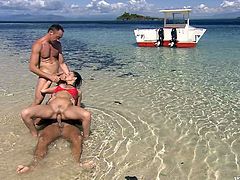 This is one of the hottest beach sex porn videos ever shot in the industry. This divine brunette gives herself to two men and plays with their dicks.