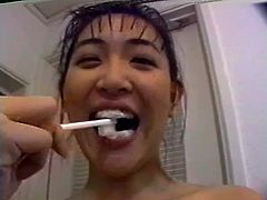 Dirty japanese enjoys loads of jizz splashing her face in bukkake porn session