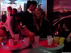 Naughty lesbians dancing lasciviously and fucking giant cocks in a club sex party