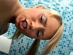 Mia is a sexy pigtailed blonde who loves stroking her vag with a glass toy