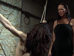 Skinny brunette chic naked Anna is going through her first BDSM sex experience ever. She gets crucified and bandaged by insatiable brunette domina in BDSM-involved sex video by 21 Sextury.