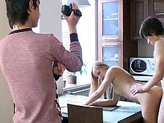 Young beauty gets filmed when having her juicy cunt nailed on the kitchen table