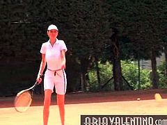 Aria Valentino plays tennis outdoors