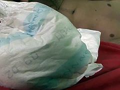 This guy has a diaper fetish and this wild brunette is ready to make his fantasy even more intense. See him getting his ass banged by a nasty bitch with a strap-on cock.